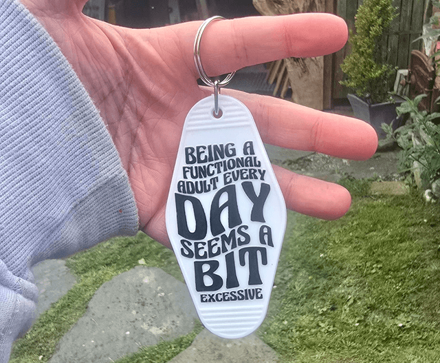 Excessive Adulthood Motel Keyring