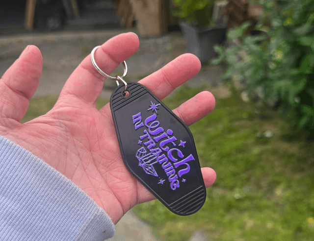 Witch in Training Motel Keyring